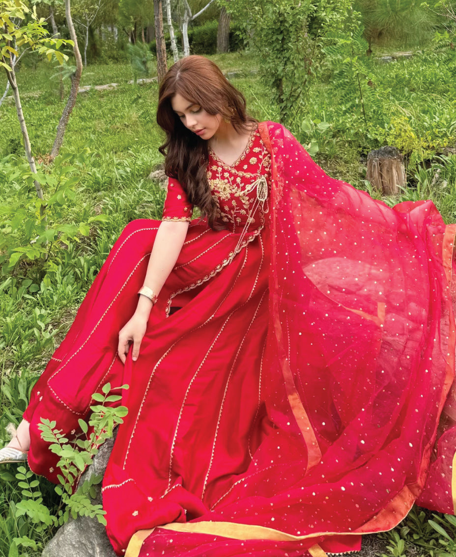 Sheer dupatta paired with crimson red women’s formal anarkali frock featuring refined embroidery
  
