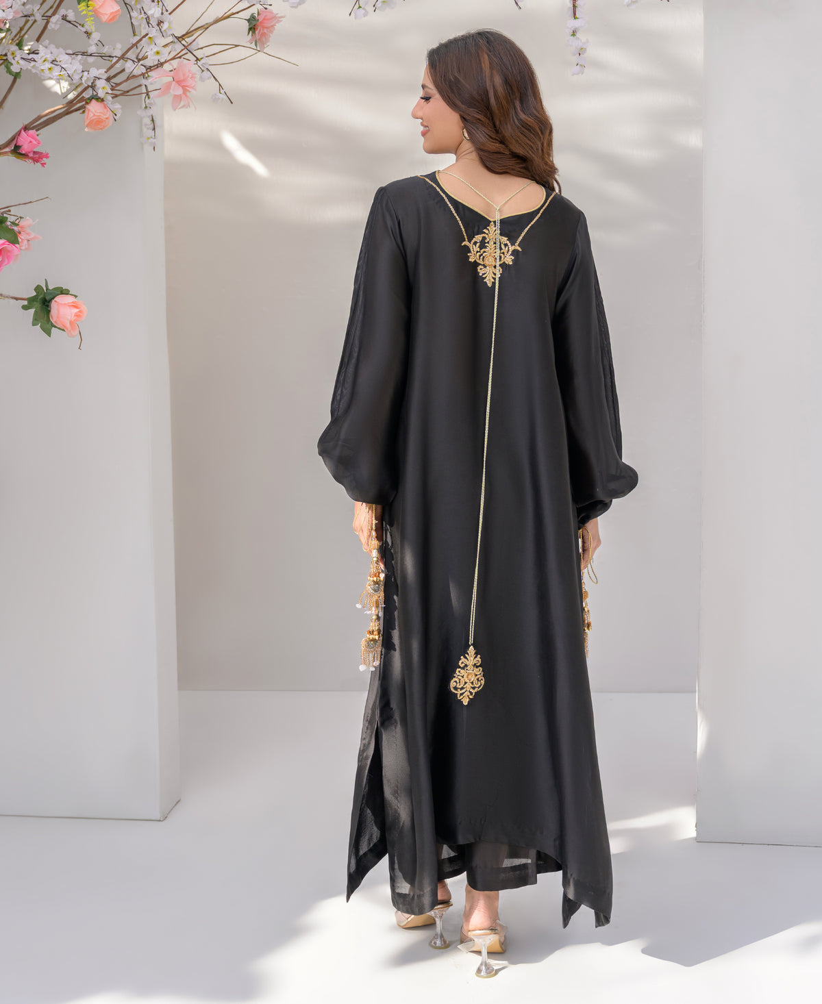 Ezel black shesha silk with kora dabaka detailing motif and tassel on back withround neck