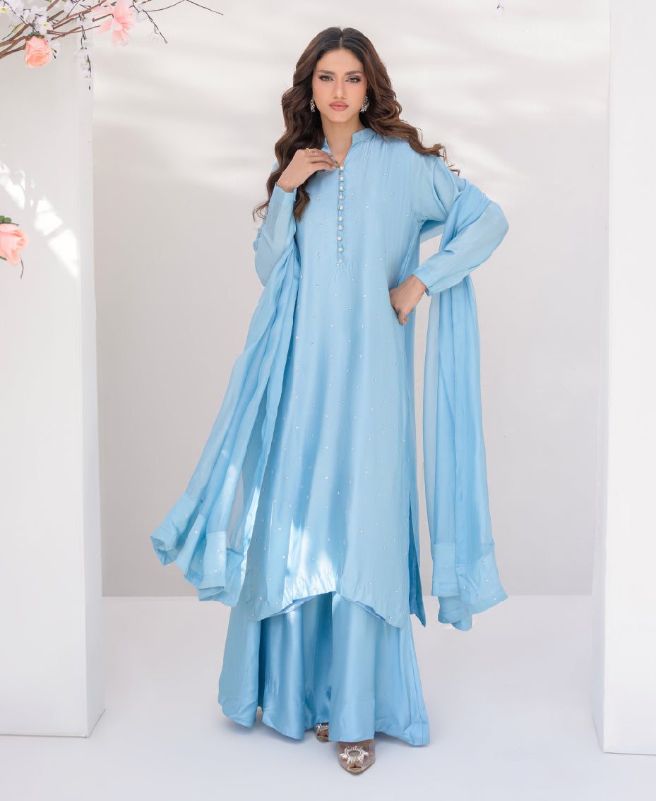 Blue raw silk ensemble with A-line women silhouette
