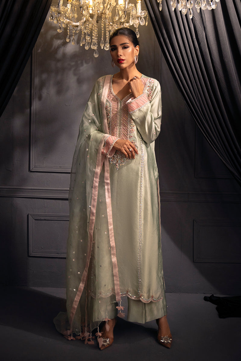 Mint green Pakistani designer formal outfit featuring intricate 3D embroidery, beadwork detailing and sheer organza dupatta for wedding and festive wear
