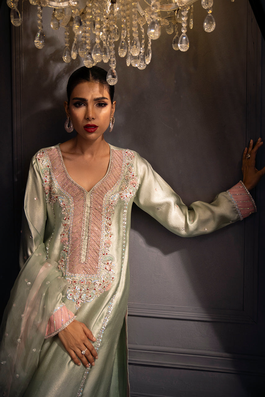 Designer formal outfit showcasing intricate embroidery, embellished cuffs and premium Missouri silk craftsmanship in mint green

