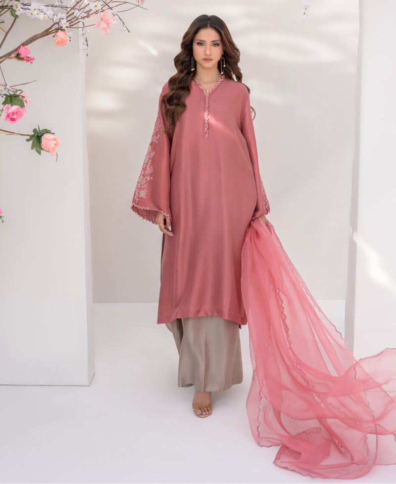  a pink traditional outfit with a ivory pant and dupatta