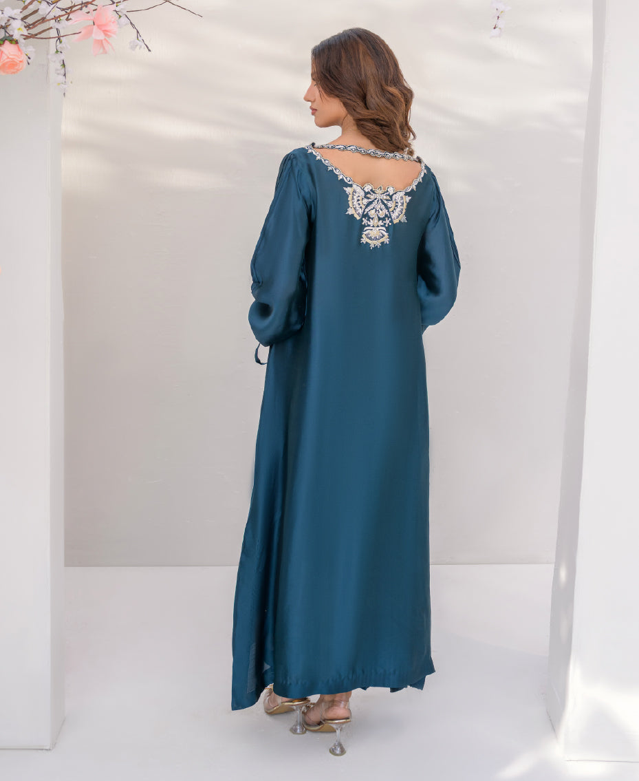 Teal ensemble with intricate back design on neck line stylish applique silver embroidery
